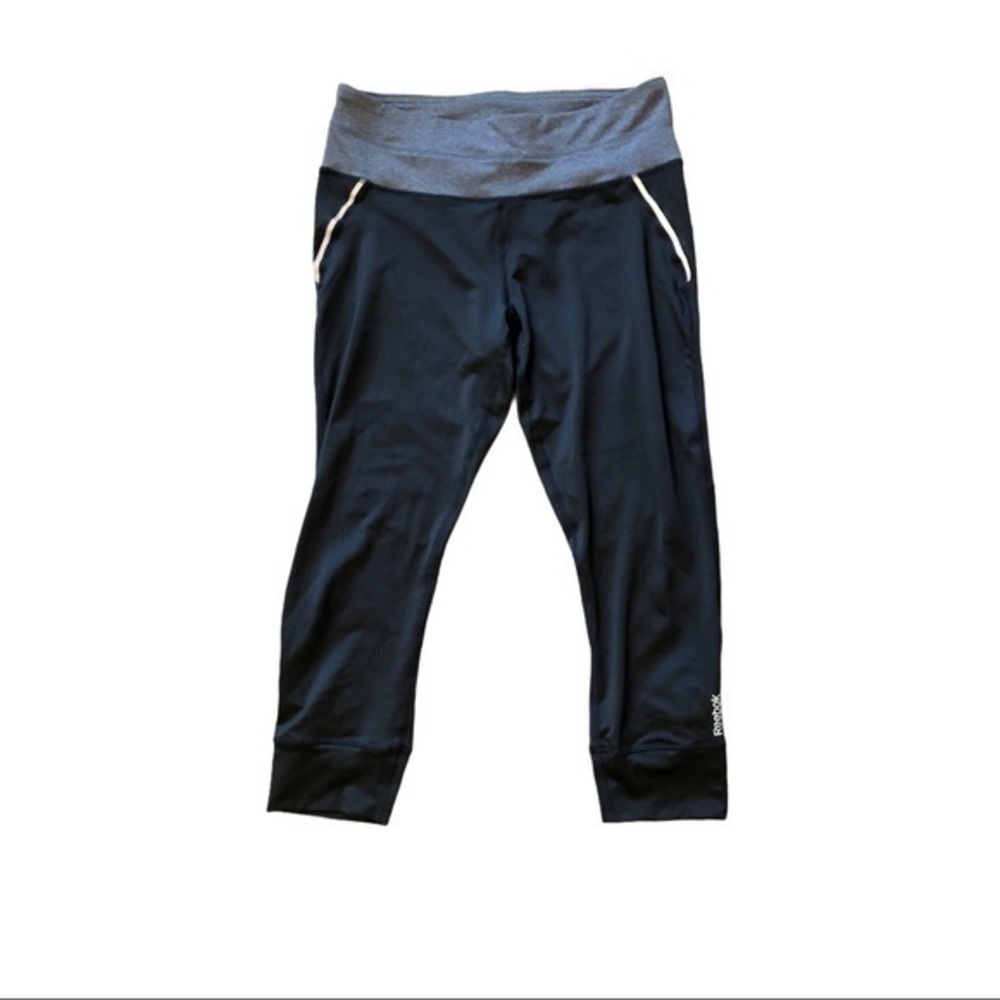 Reebok size large leggings with reflective accents